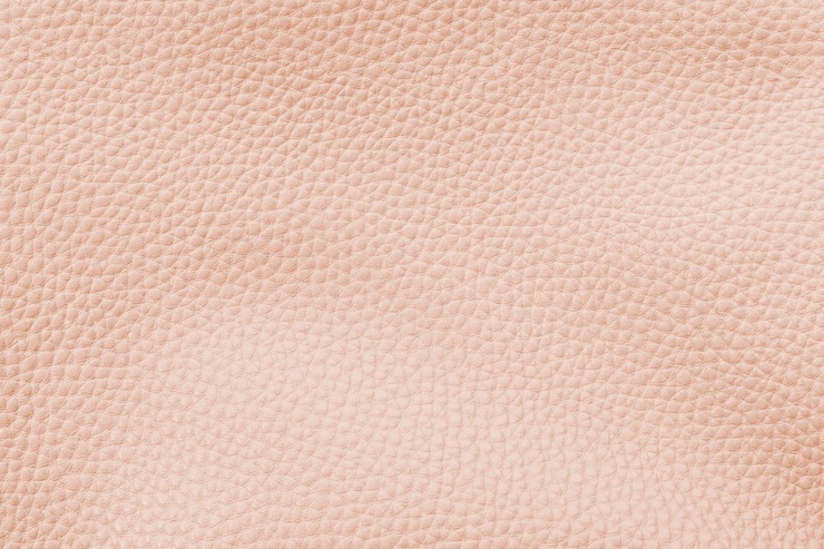 Free Photo pastel orange artificial leather textured background