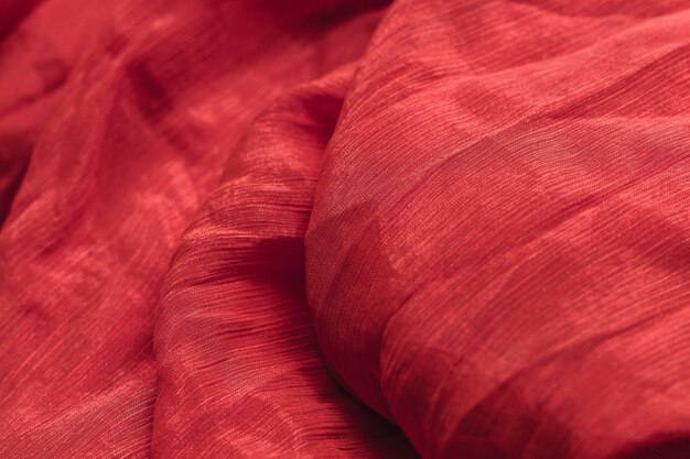 Pastel red fabric material texture with copy space