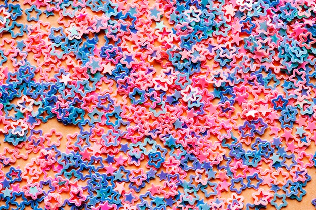 Pastel star sequin abstract background