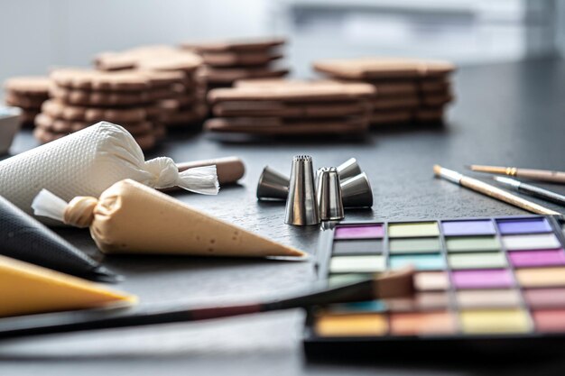 Pastry bags with cream for decorating gingerbread