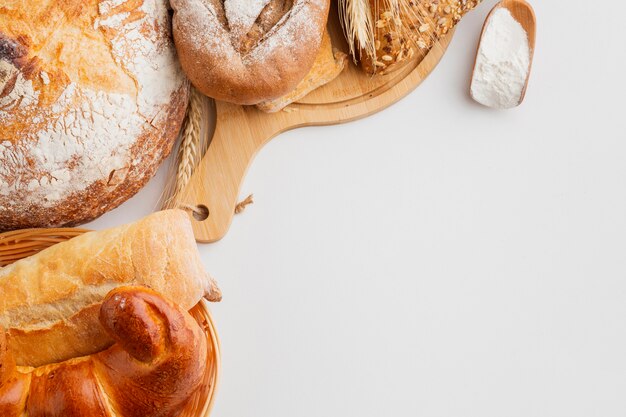 Pastry in basket and wooden board