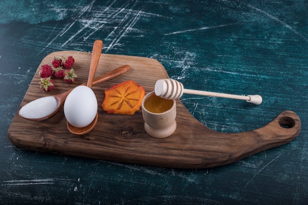 Pastry ingredients on a wooden platter