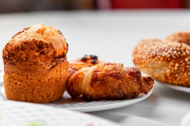 Pastry in a plate side view on a table