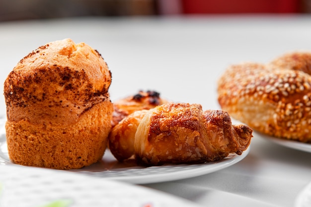 Pastry in a plate side view on a table