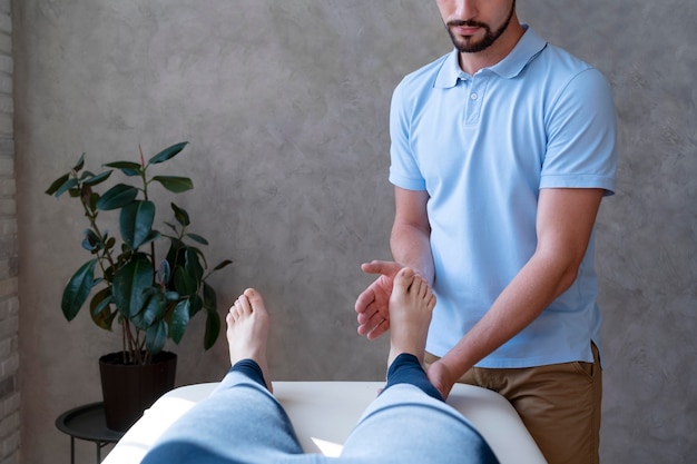 Free photo patient doing physiotherapy close up