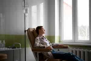 Free photo patient getting chemotherapy treatment