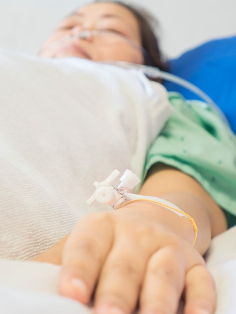 A patient is receiving medication via intravenous therapy