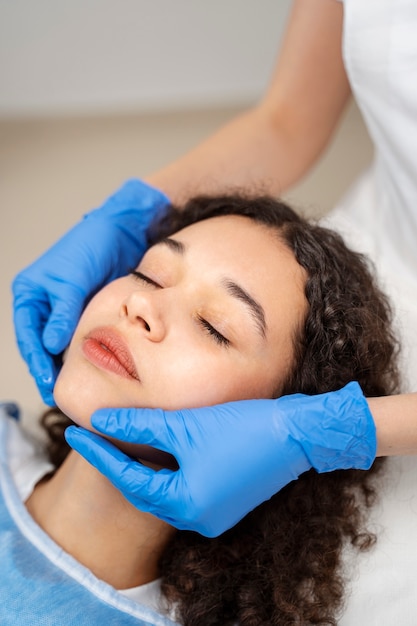 Patient undergoing microneedling procedure