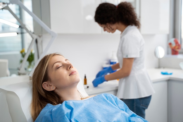 Patient undergoing microneedling procedure