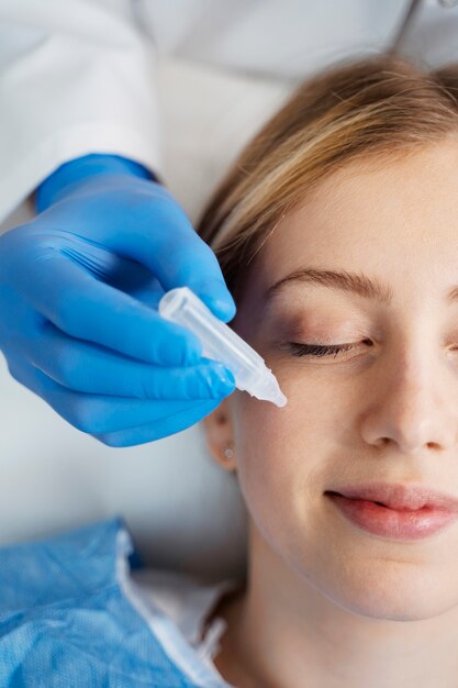 Patient undergoing microneedling procedure