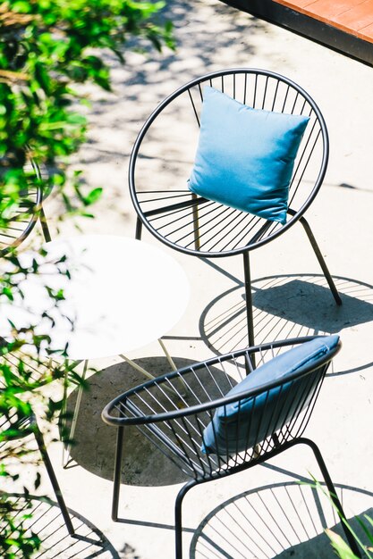 Patio with Pillow on chair and table set