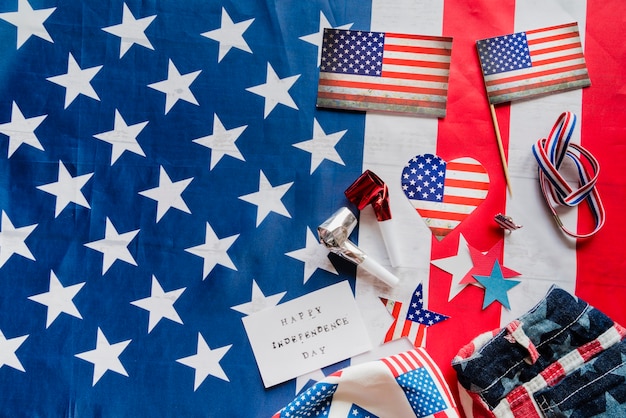 Patriotic items on United States flag background