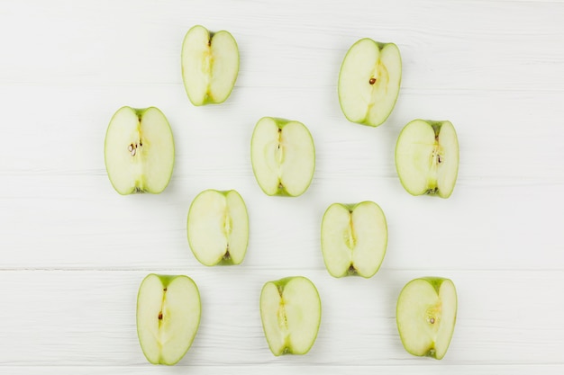 Pattern apple slices on white background