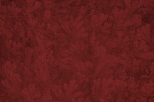 Узорчатый красный бетон текстурированный фон