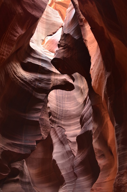 Patterned and textured walls of a red rock sandstone canyon.