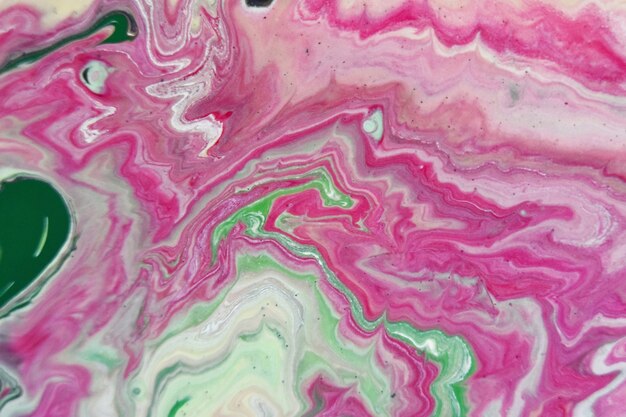 Patterns in the water with colorful mixed paints