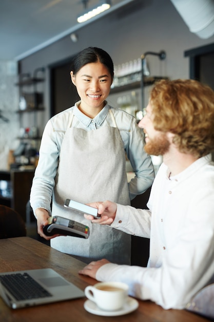 Paying for drink with smartphone