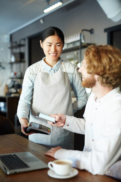 Paying for drink with smartphone