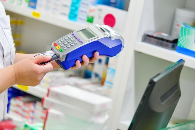 Paying with a credit card in pharmacy background