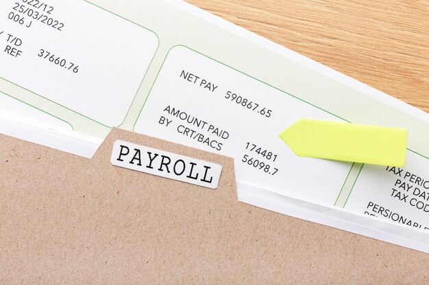 Payroll still life with document