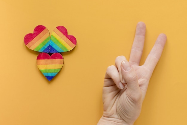 Free photo peace sign and rainbow hearts