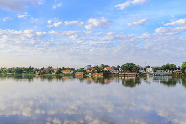 Peaceful Kamphaeng Phet town waterfront on Ping River with reflection