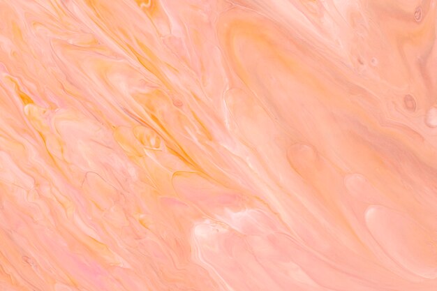 桃の大理石の渦巻き模様の背景手作りのアクリル絵の具