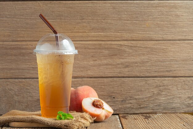 Персиковый чай Персиковые продукты питания и напитки Концепция питания пищевых продуктов.