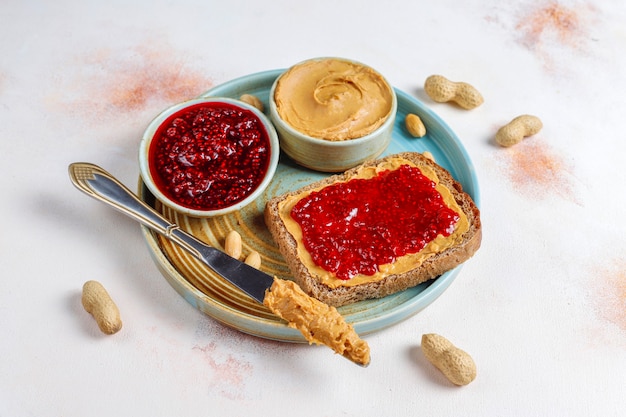 Peanut butter sandwiches with raspberry jam