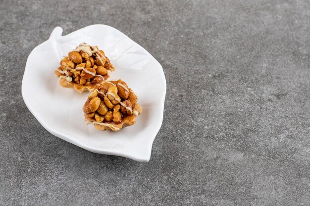 of peanut cookies on white plate.