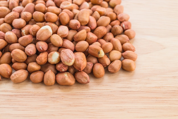 peanuts on wood background