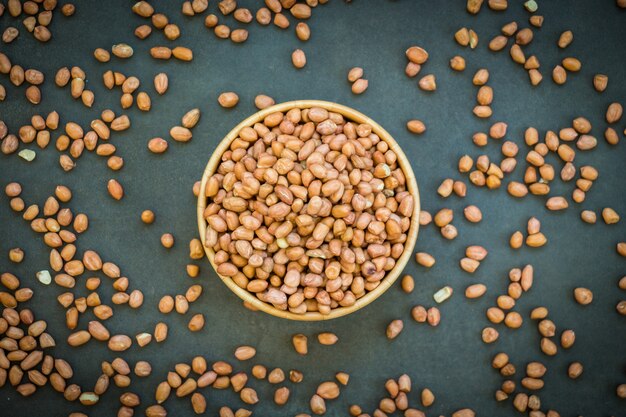 Peanuts in wooden bowl