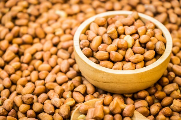 Peanuts in wooden bowl