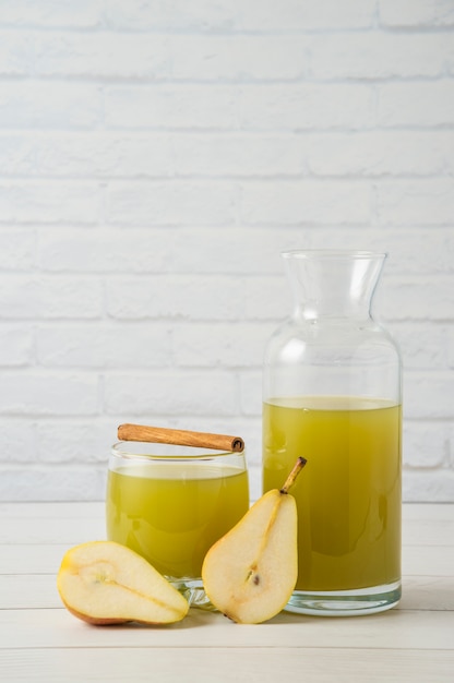 Pear juice with cinnamon flavour in glass jar