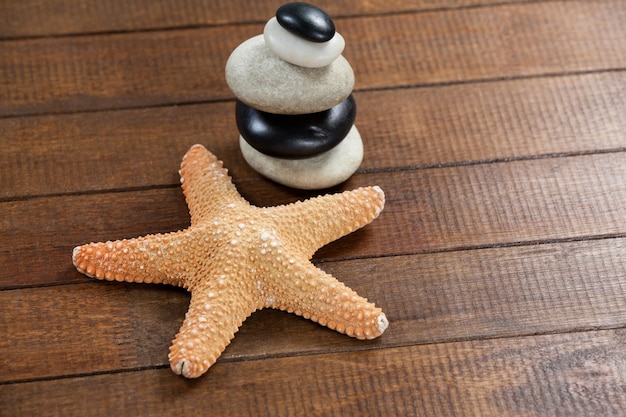 Pebble stones with star fish