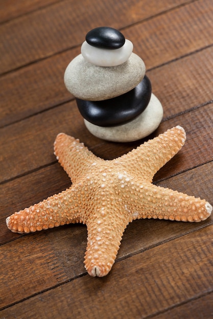 Pebble stones with star fish