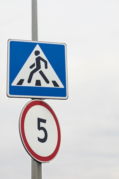 Pedestrian crosswalk sign in the city