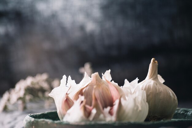 Peeled garlic on plate