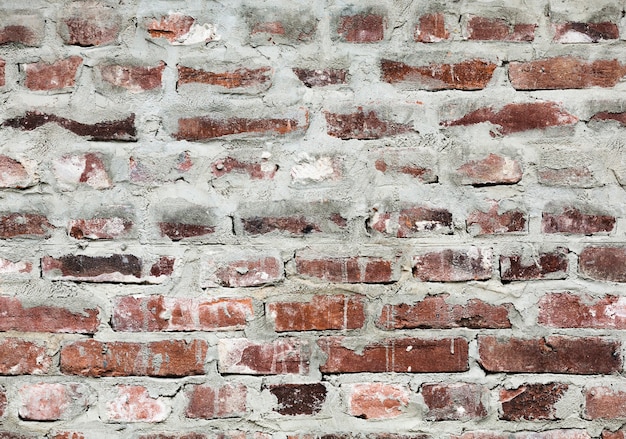 Peeled retro bricks texture background