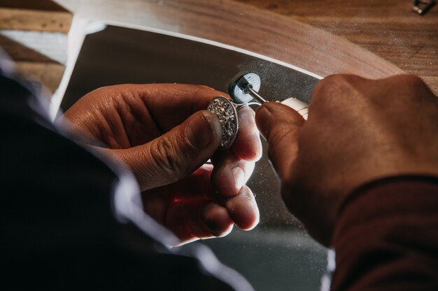 Peeling metallic jewelry ring
