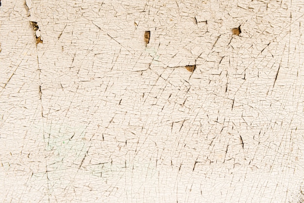 Peeling paint on an old wooden floor