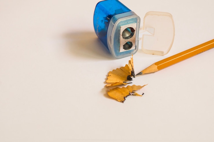 Free Photo pencil and sharpener on white