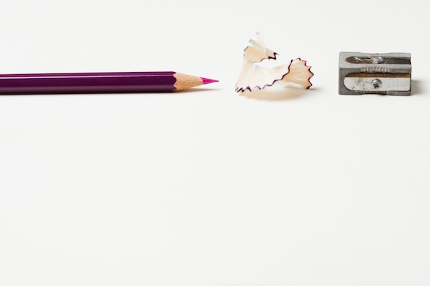 Pencil with pencil shavings and sharpener