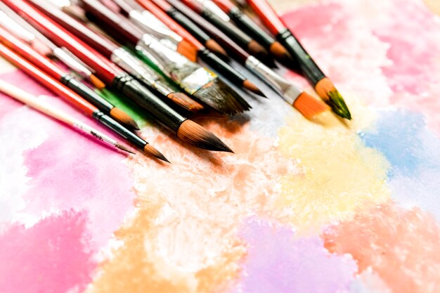 Pencils and brushes on desk