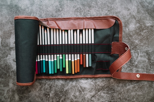 Free photo pencils in leather bag