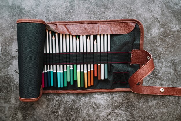 pencils in leather bag