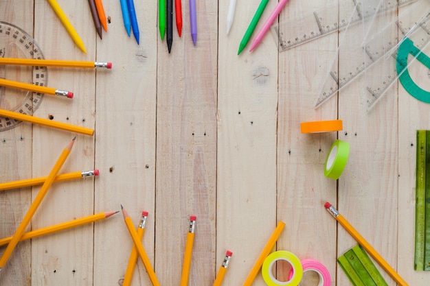 Pencils and materials on wood