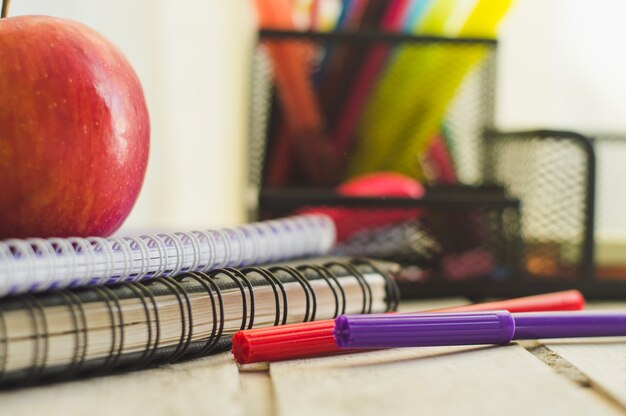 Pens and pencils on table