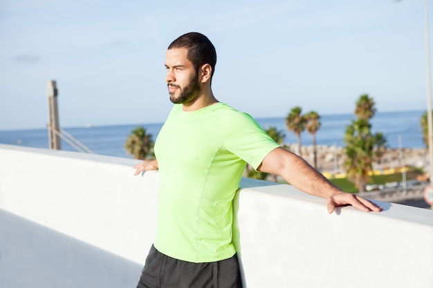 Pensive free man enjoying summer vacation