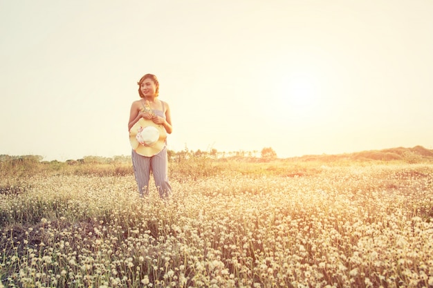 Pensive girl in the meadow